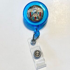 Retractable badge holder